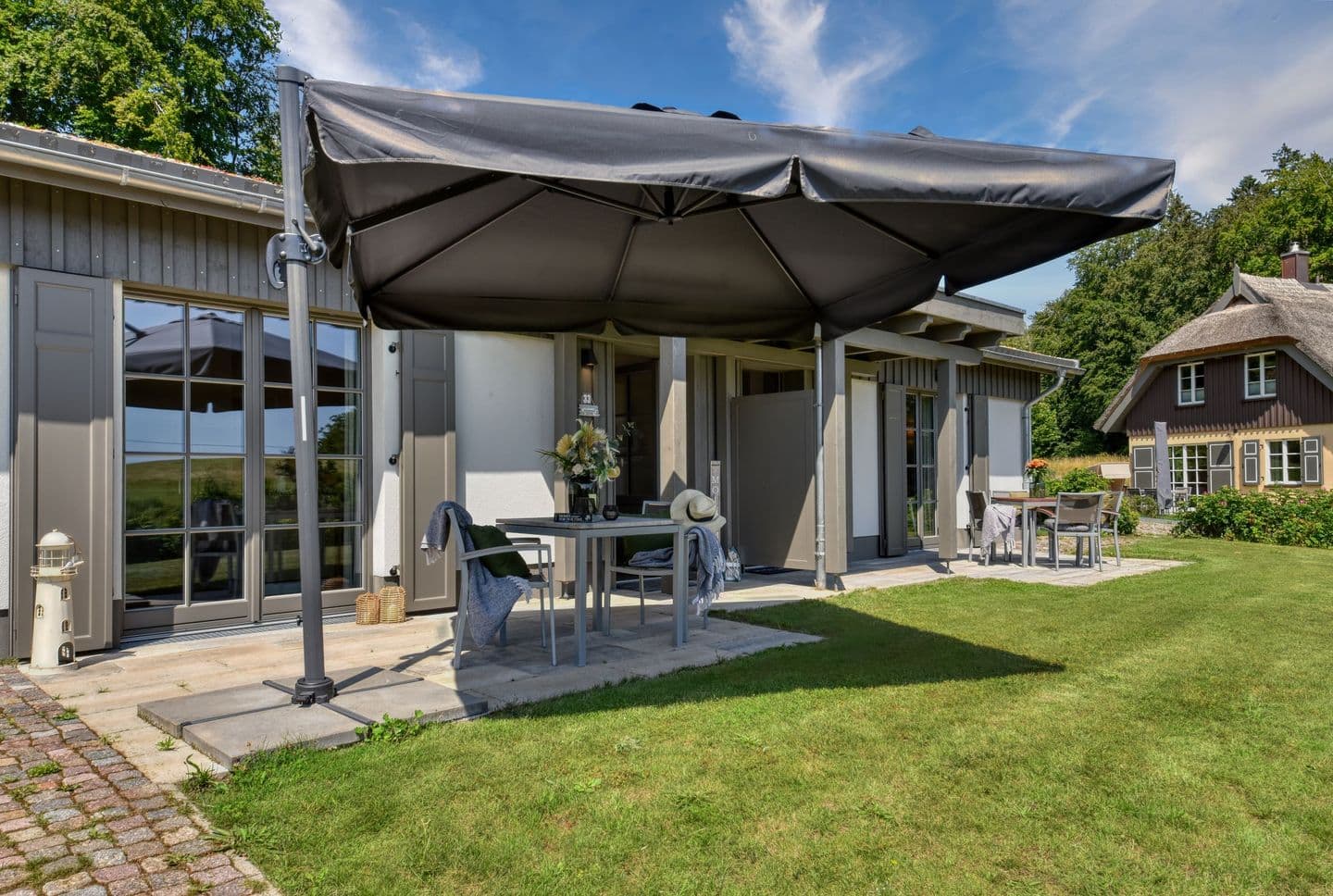 Ferienhaus Frische Brise 33 Feriendorf Klein Stresow Rügen in Klein Stresow – Terrasse
