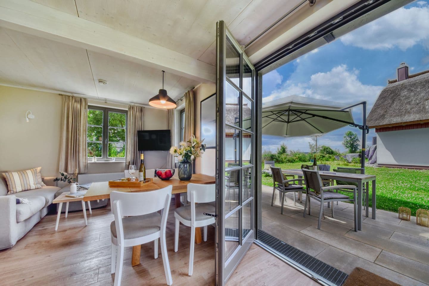 Ferienhaus Huus Waterkant 18 Feriendorf Klein Stresow Rügen in Klein Stresow – Wohnzimmer