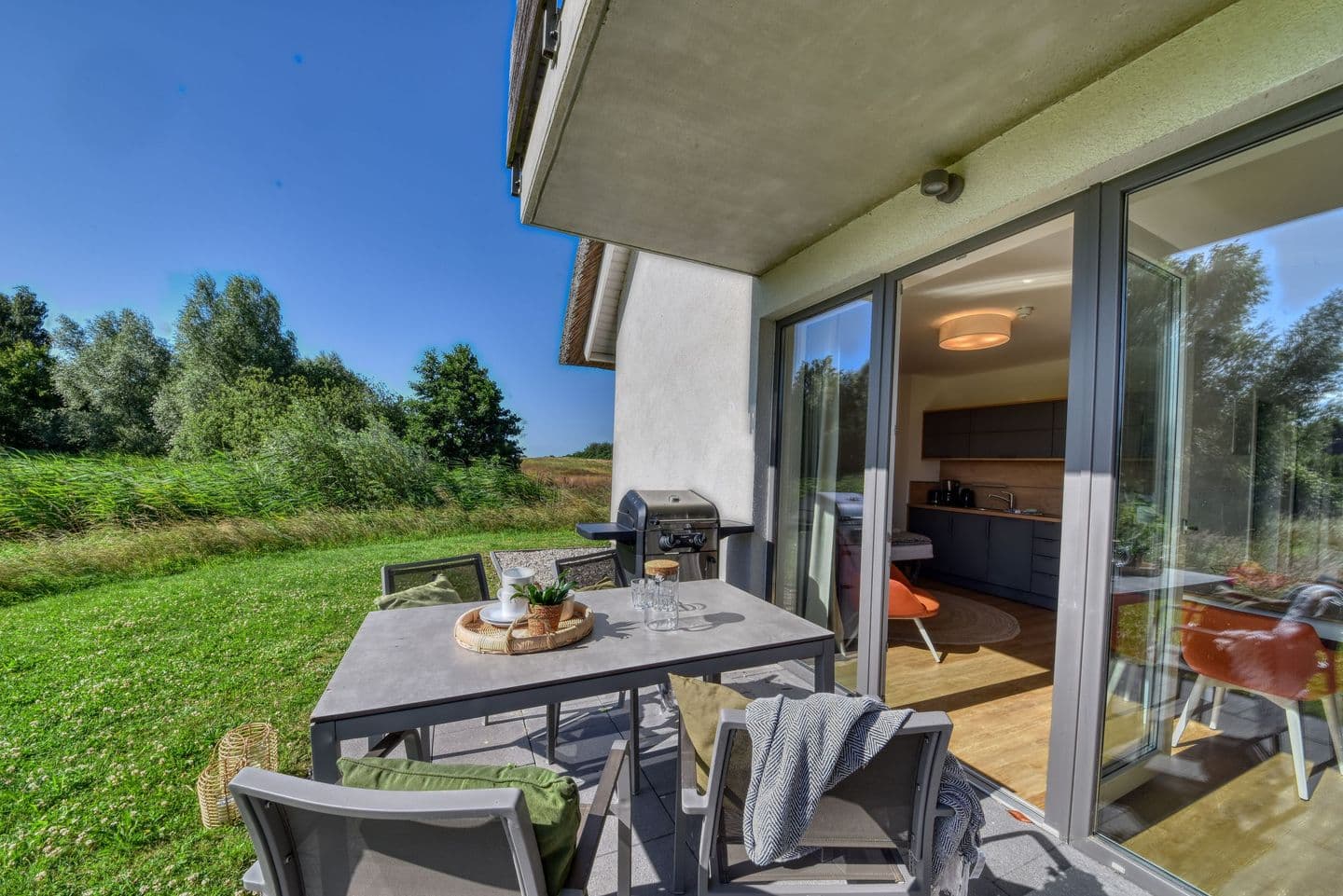 Ferienwohnung Haubentaucher 25 im Wreecher Idyll Rügen in Wreechen – Terrasse